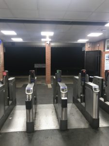 Well lit ticket gate with new LED lighting for High Wycombe station, Buckinghamshire.