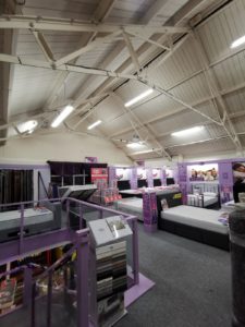 New retail lighting encourages greater conversion rates at United Carpets, Grimsby, Lincolnshire.
