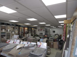 New LED lighting helps with colour selection at Harper and Pye carpet shop in Blackpool, Lancashire.