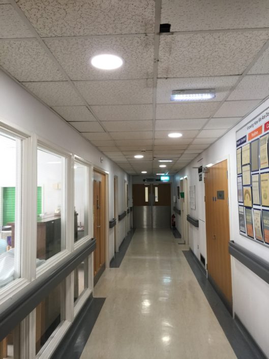 Bright new LED lighting installation to an internal corridor at Clifton Hospital, Lytham St Annes.